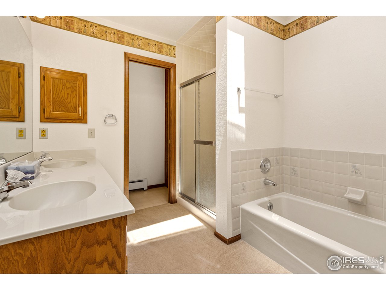11900 Rist Canyon Road Bellvue, CO 80512 - Photo 22 of 34 a bathroom with a bathtub and a sink