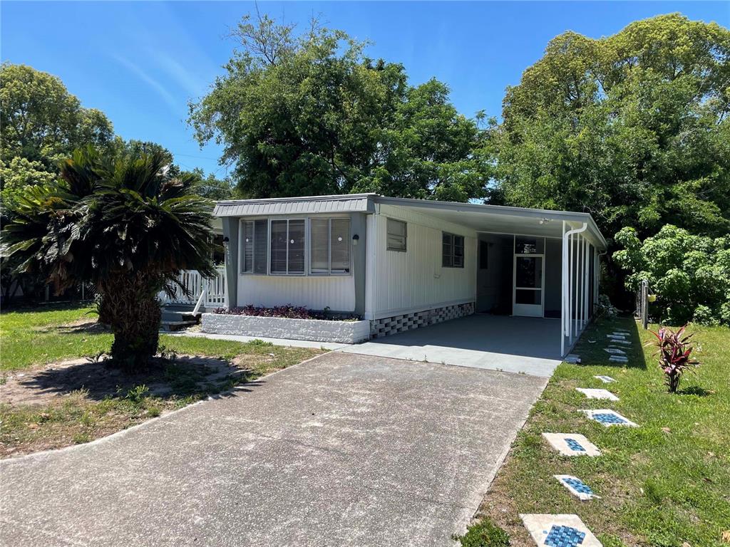4211 Athens Avenue New Port Richey, FL 34652 - Photo 1 of 1 front view of a house with a yard