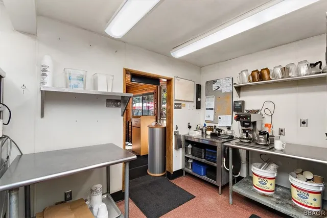a kitchen with a stove and a sink