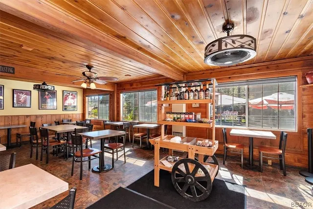 a living room with patio furniture
