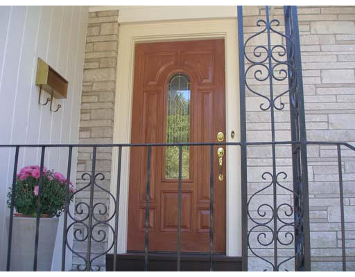 71 Cynthia Road Newton, MA 02459 - Photo 2 of 12 a view of a door and chair in the interior