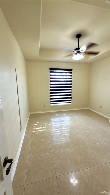 2104 Foggy Loop Laredo, TX 78045 - Photo 16 of 23 a view of an empty room with a window