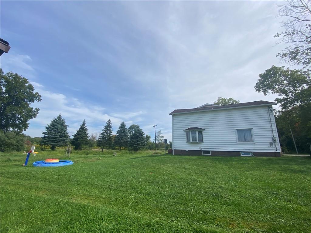 13662 Sanford Road West Springfield, PA 16443 - Photo 17 of 23 a house view with a play ground in front of it