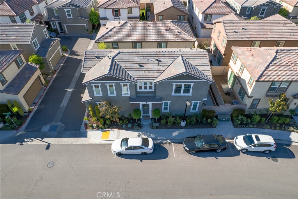 4244 Bravado Riverside, CA 92505 - Photo 23 of 25 a front view of a house with garden and parking