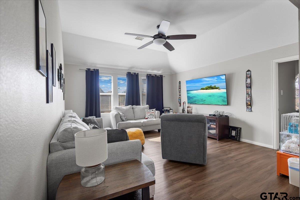 401 Boxwood Trail Forney, TX 75126 - Photo 18 of 45 a living room with furniture and a flat screen tv
