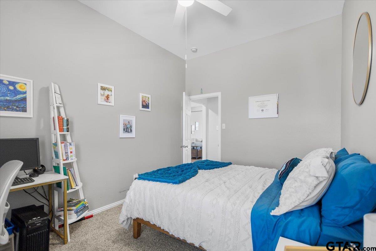 401 Boxwood Trail Forney, TX 75126 - Photo 23 of 45 a bedroom with a bed and a window