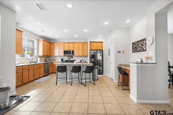 a bathroom with a shower and a toilet
