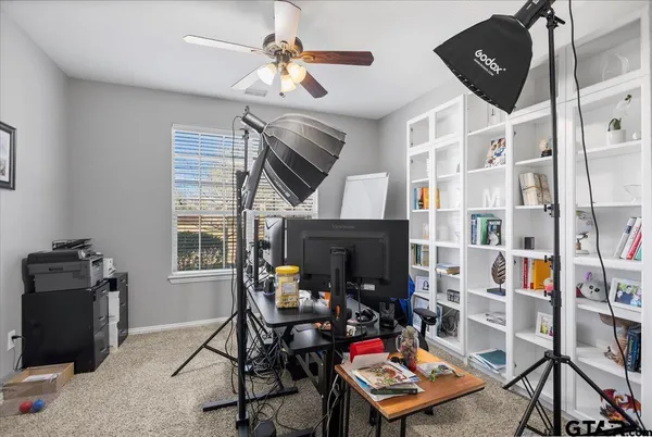 an aerial view of a swimming pool and lake view