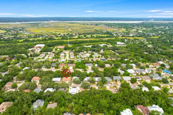 a view of city with ocean