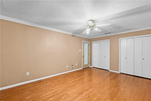 a en suite bathroom with a sink a mirror and a shower