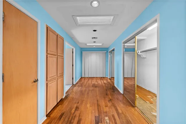 a view of a room with racks on the wall