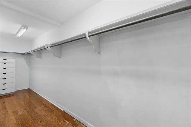 a large space with lots of wooden cabinets