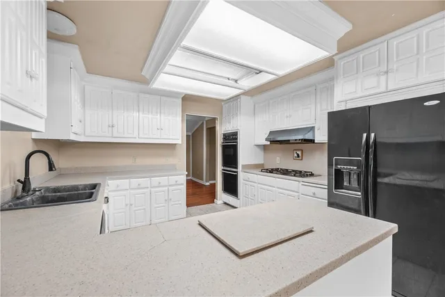 a view of livingroom with furniture wooden floor and window