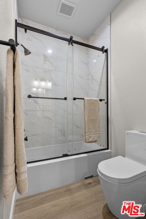 28701 Delaware Drive Tehachapi, CA 93561 - Photo 15 of 15 a bathroom with a toilet and a shower
