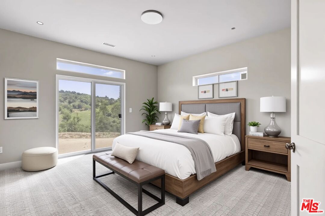 28701 Delaware Drive Tehachapi, CA 93561 - Photo 8 of 15 a bedroom with a bed and a large window