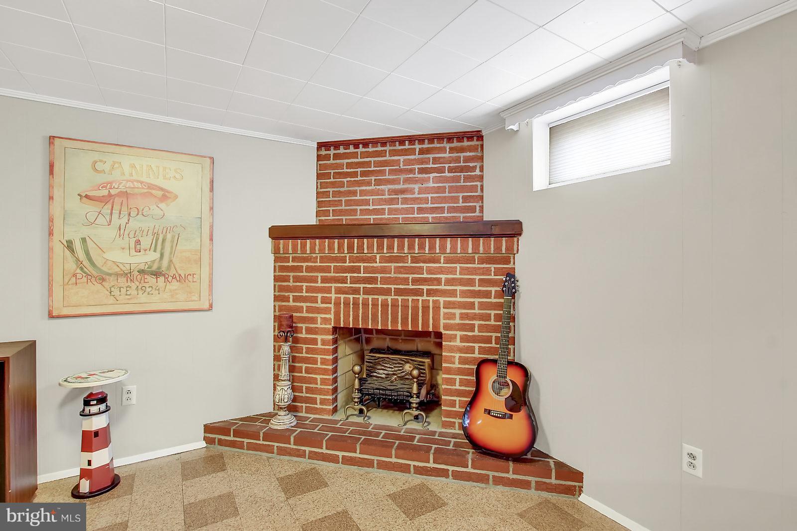 2436 Lakewood Road Baltimore, MD 21234 - Photo 24 of 31 Gas fireplace in recreation room for ambiance!