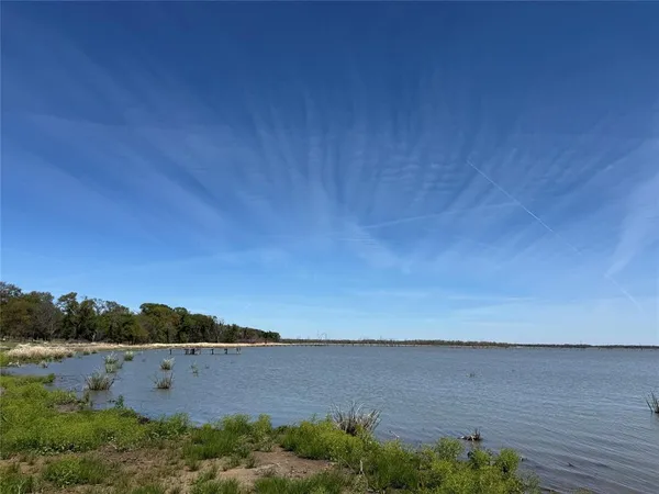 an aerial view of ocean with outdoor space