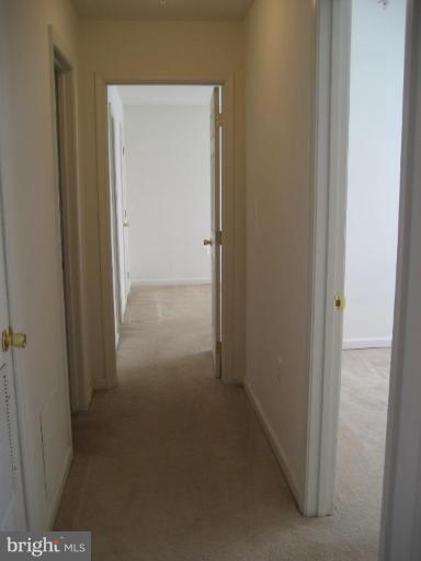 3814 Bel Pre Road, Unit 38149 Silver Spring, MD 20906 - Photo 8 of 27 a view of a hallway