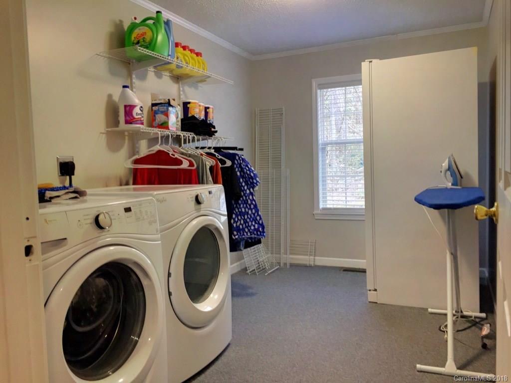2915 Locust Grove Road Hendersonville, NC 28792 - Photo 20 of 30 a view of storage and utility room with toys and toys