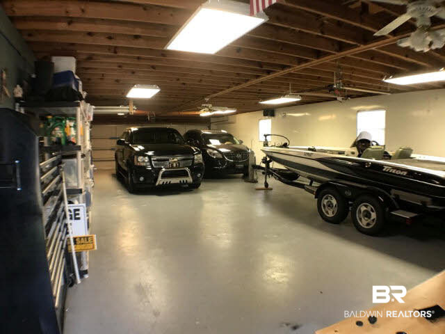 103 Vega Circle Daphne, AL 36526 - Photo 20 of 23 approximately 1400 sf of garage space with room for 4 vehicles