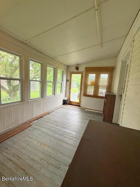 556 Mann Hill Road Pownal, VT 05261 - Photo 12 of 36 wooden floor in an empty room with a window