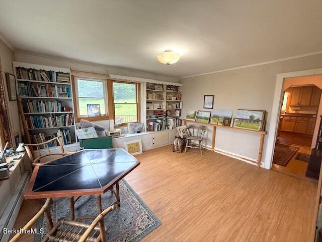 556 Mann Hill Road Pownal, VT 05261 - Photo 19 of 36 a living room with furniture and a wooden floor