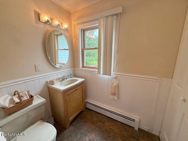 556 Mann Hill Road Pownal, VT 05261 - Photo 22 of 36 a bathroom with a sink and a mirror