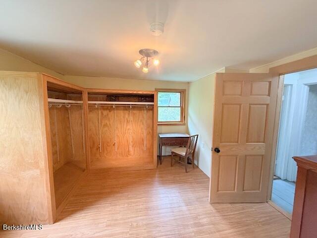 556 Mann Hill Road Pownal, VT 05261 - Photo 26 of 36 a view of a room with wooden floor and furniture