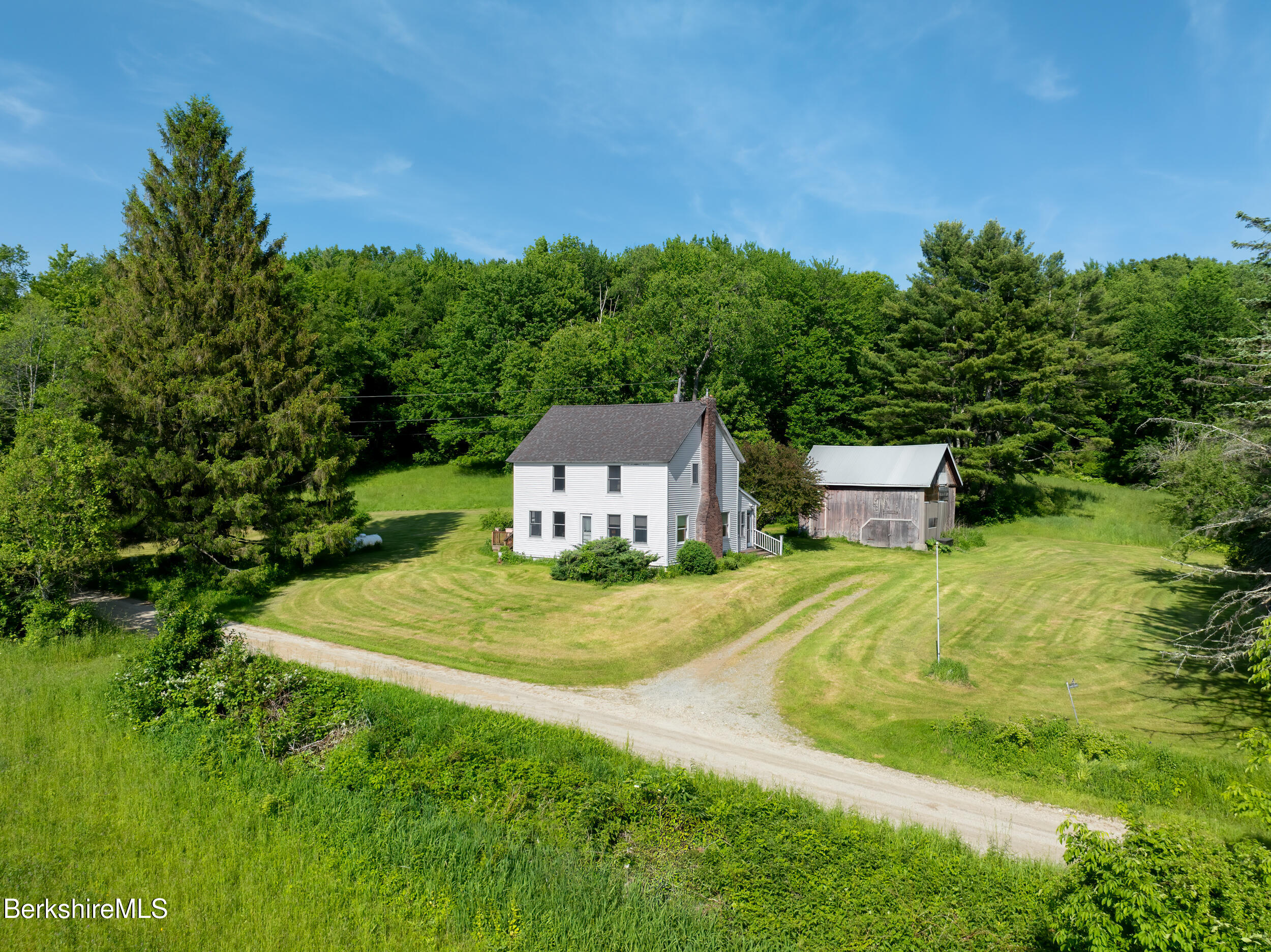 556 Mann Hill Road Pownal, VT 05261 - Photo 3 of 36 a view of a house with a yard