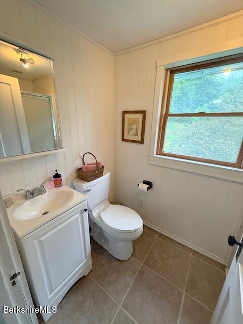 556 Mann Hill Road Pownal, VT 05261 - Photo 31 of 36 a bathroom with a sink toilet and a window