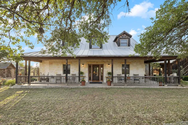 a front view of a house having patio
