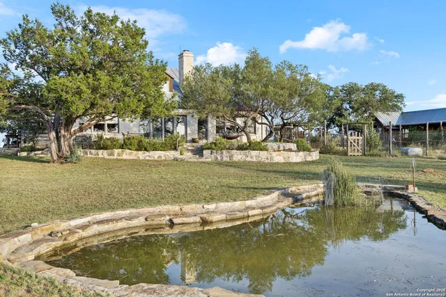 a view of house with ocean view