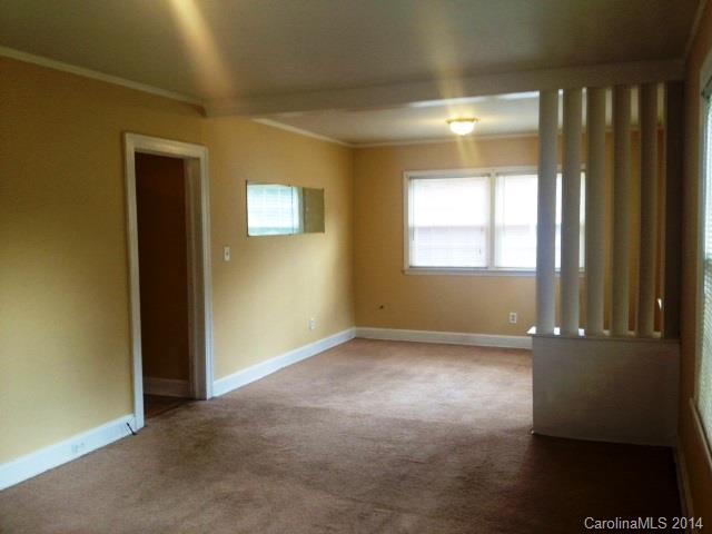 1314 Skyview Road Charlotte, NC 28208 - Photo 3 of 12 an empty room that has a window