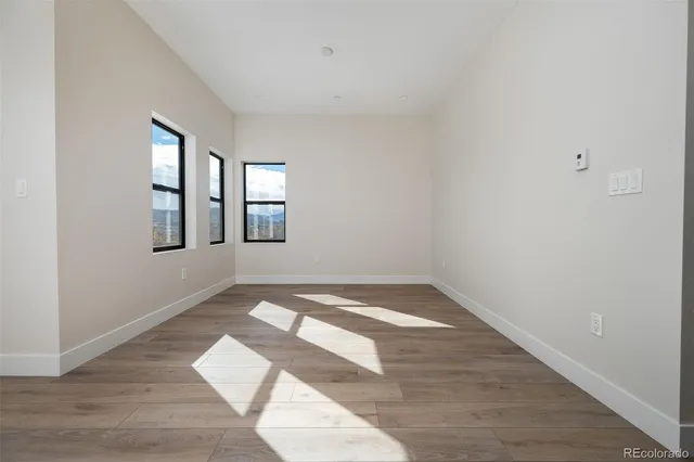 a bathroom with a double vanity sink and mirror