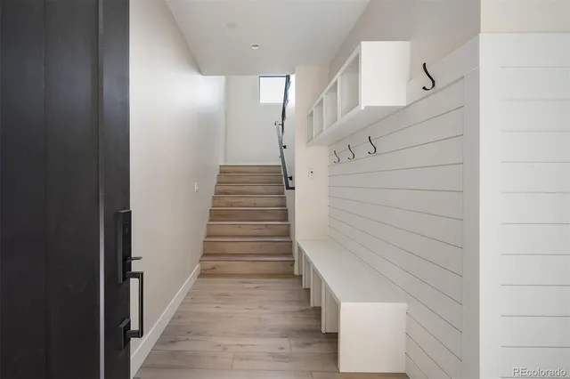 a kitchen with stainless steel appliances a sink a stove and a microwave