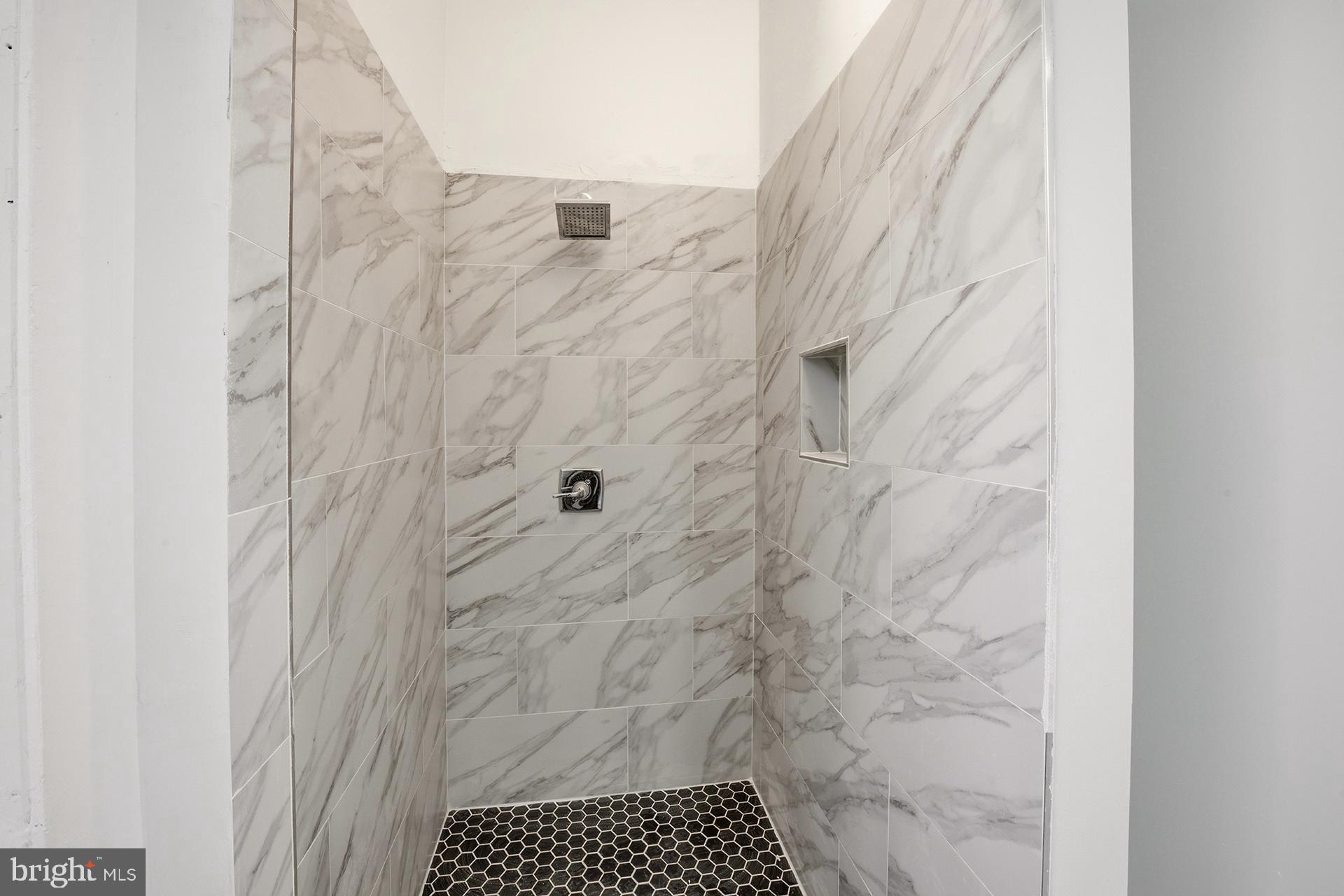 6012 Ridge Avenue, Unit 5 Philadelphia, PA 19128 - Photo 10 of 19 a bathroom with a shower