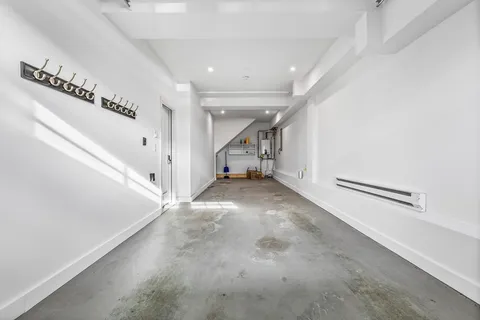 a view of a hallway with staircase