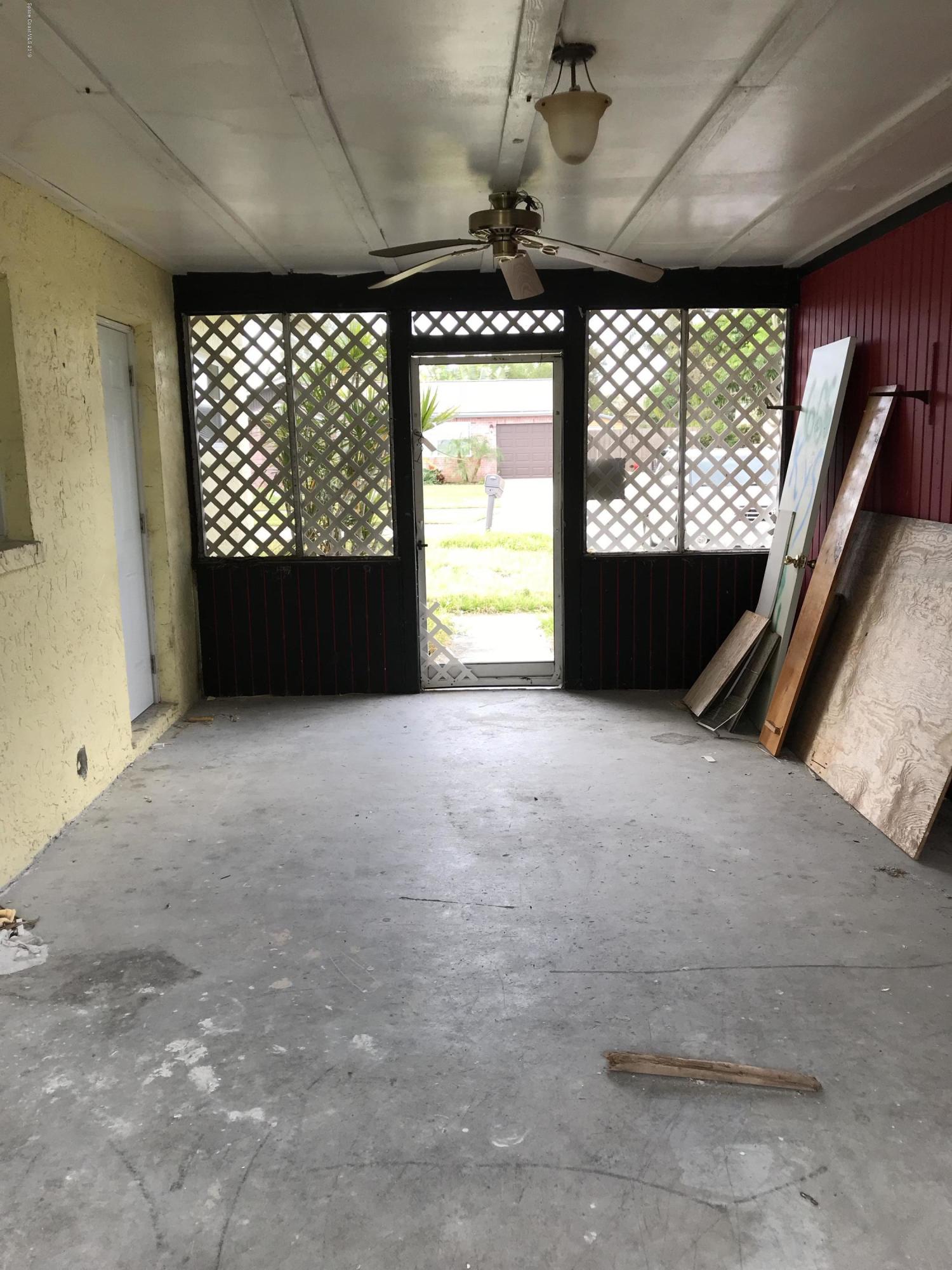 2820 Lancaster Road Melbourne, FL 32935 - Photo 19 of 30 Breezeway south