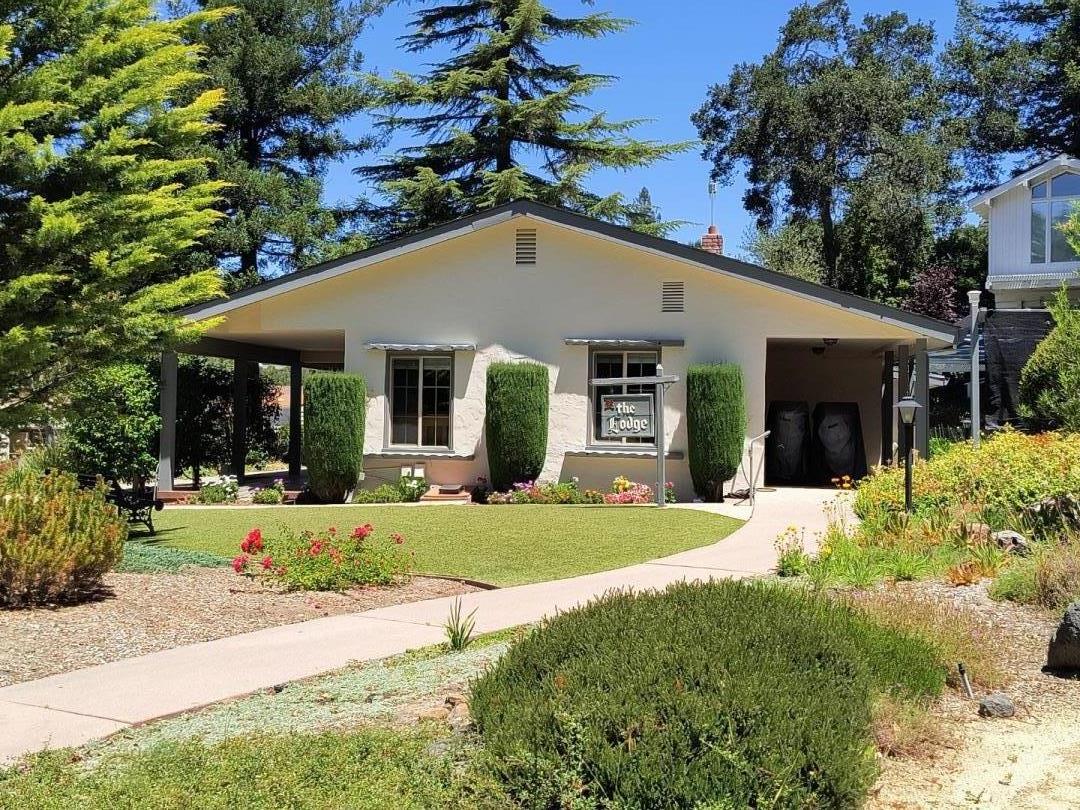 552 Bean Creek Road, Unit 126 Scotts Valley, CA 95066 - Photo 33 of 34 a front view of a house with a garden and porch