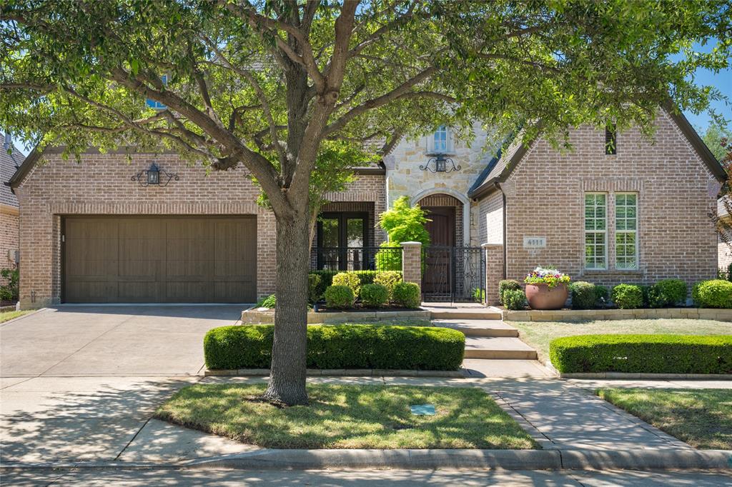 4111 Broadmoor Way Frisco, TX 75033 - Photo 2 of 38 a front view of a house with a yard and garage