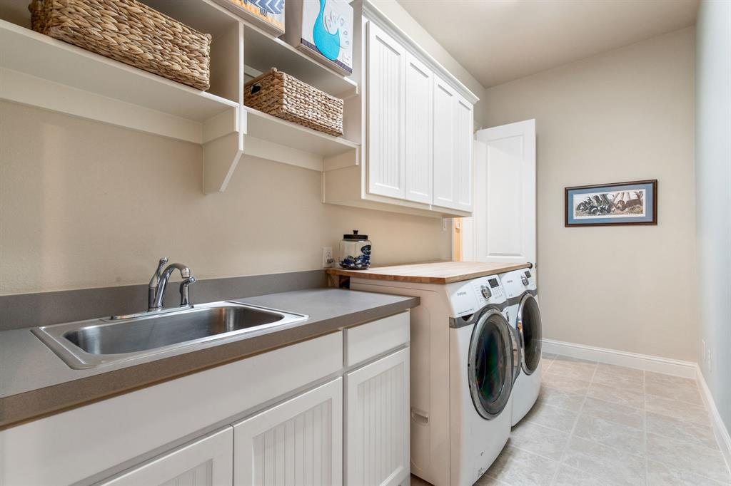4111 Broadmoor Way Frisco, TX 75033 - Photo 21 of 38 a utility room with dryer and washer