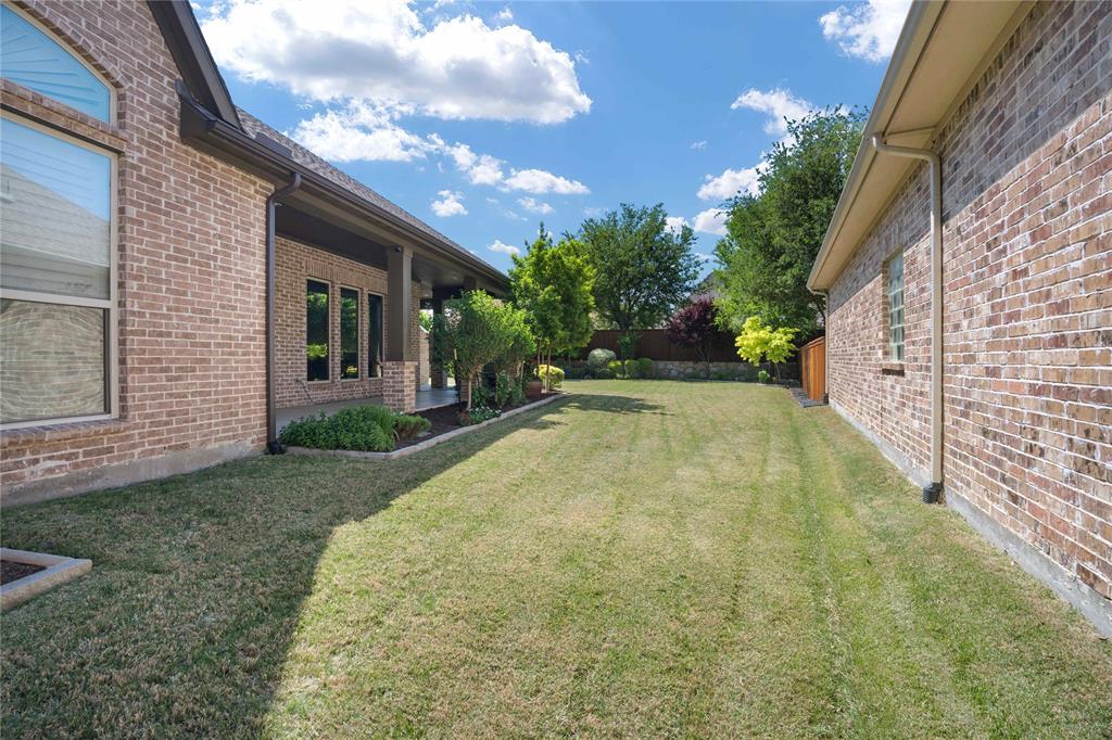 4111 Broadmoor Way Frisco, TX 75033 - Photo 30 of 38 a view of a white house with a yard
