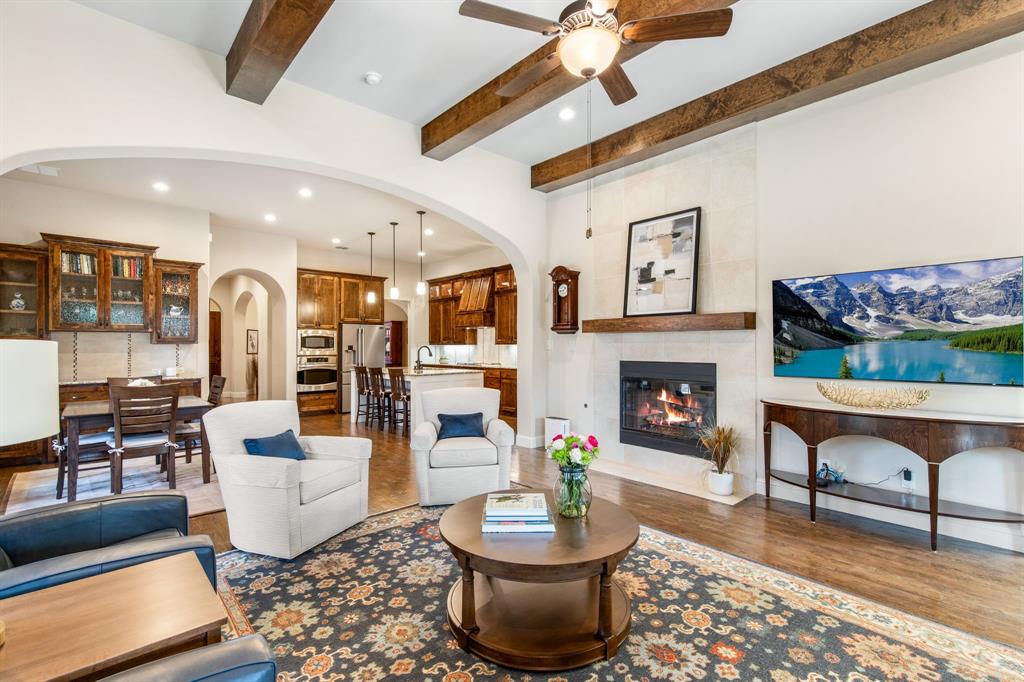4111 Broadmoor Way Frisco, TX 75033 - Photo 10 of 38 a living room with furniture and a fireplace