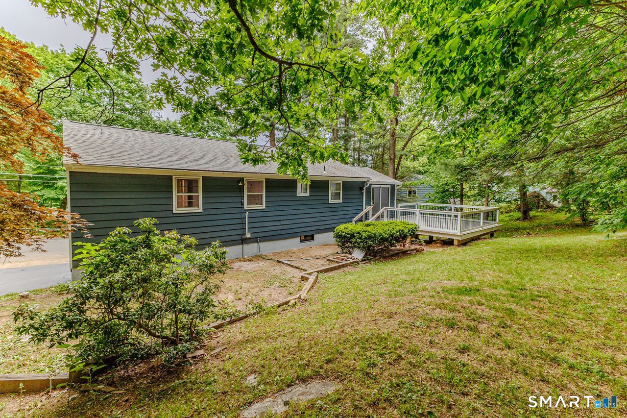 17 Rhoda Lane Bristol, CT 06010 - Photo 3 of 22 front view of a house with a yard