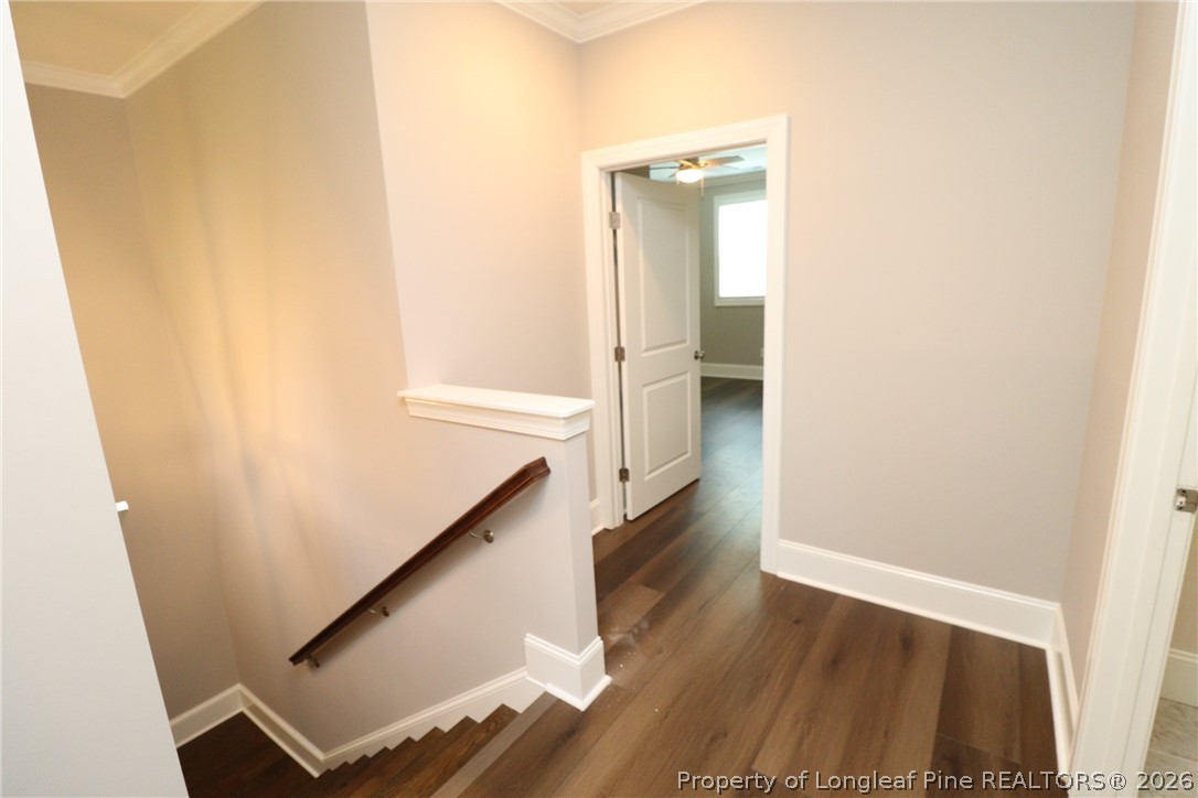 2824 Plumfield Place Raleigh, NC 27607 - Photo 19 of 33 wooden floor in an empty room