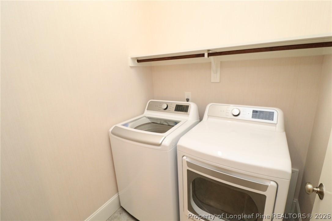 2824 Plumfield Place Raleigh, NC 27607 - Photo 20 of 33 a utility room with dryer and washer