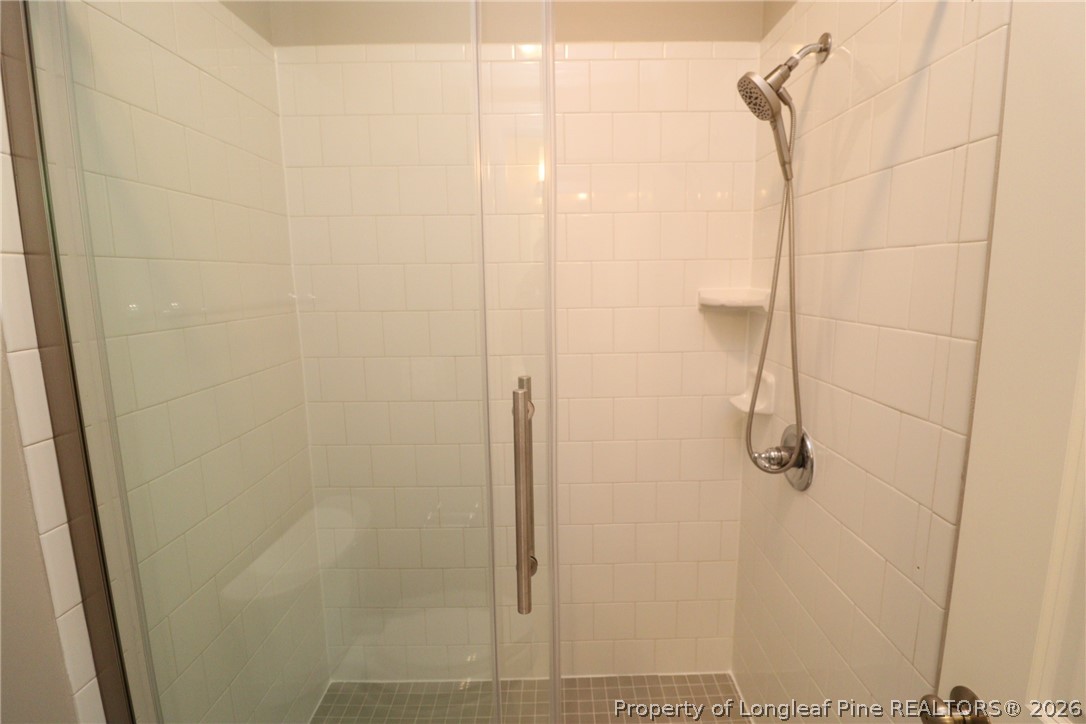 2824 Plumfield Place Raleigh, NC 27607 - Photo 28 of 33 a bathroom with a shower