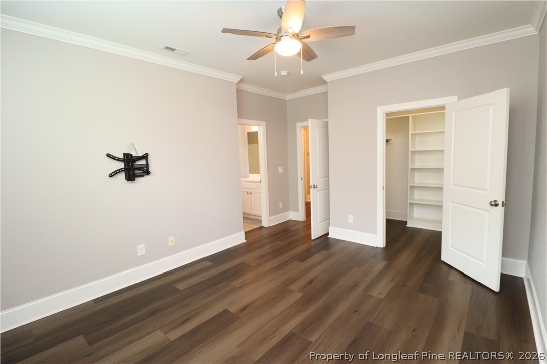 2824 Plumfield Place Raleigh, NC 27607 - Photo 31 of 33 wooden floor in an empty room with a window