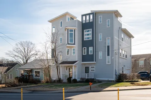 a front view of a building with street view