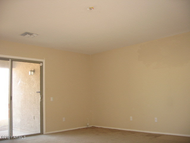 43852 West Cowpath Road Maricopa, AZ 85138 - Photo 8 of 21 023-277156-GreatRoom (2)